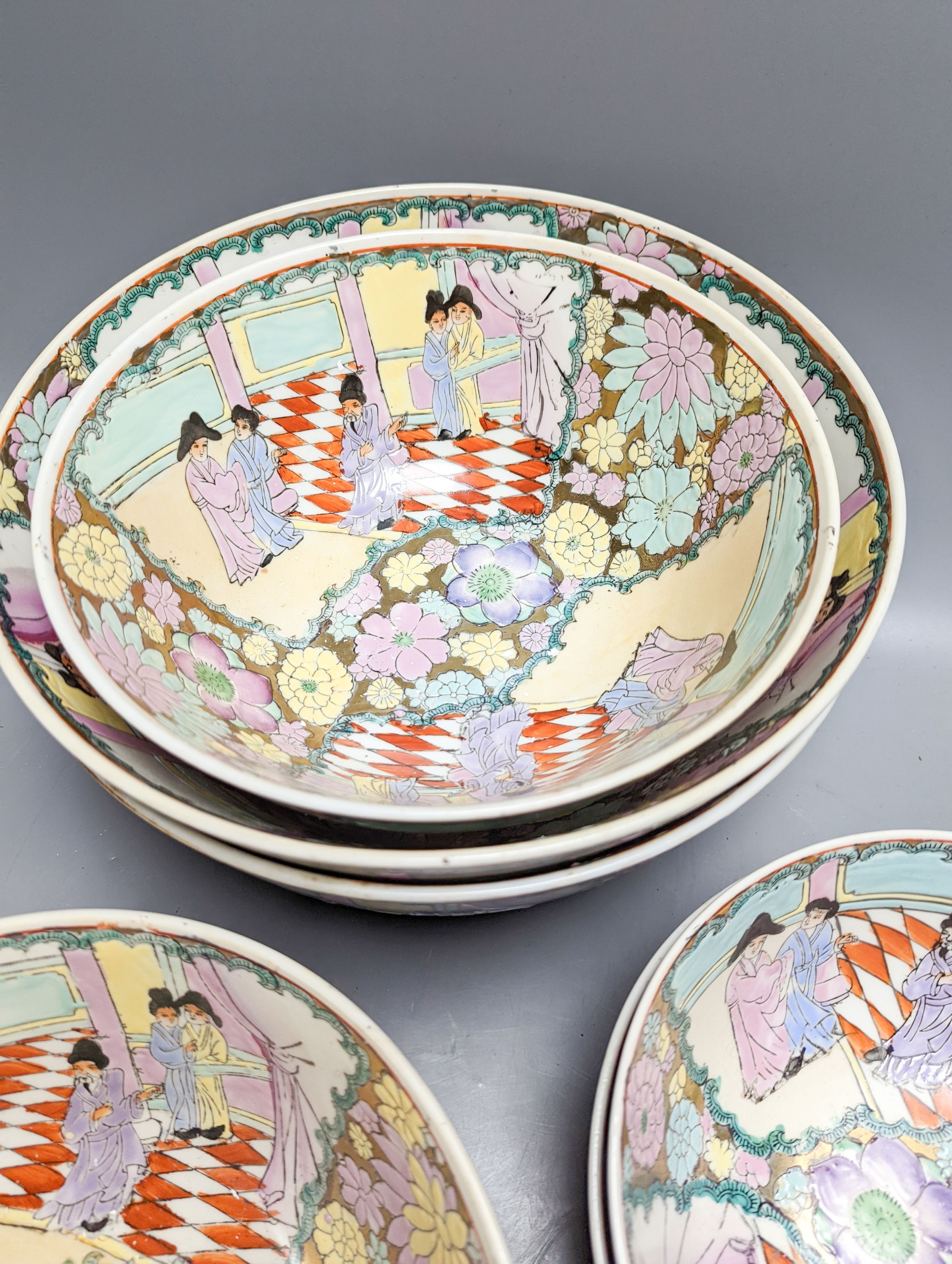 A set of six Chinese famille rose graduated bowls and a scroll picture